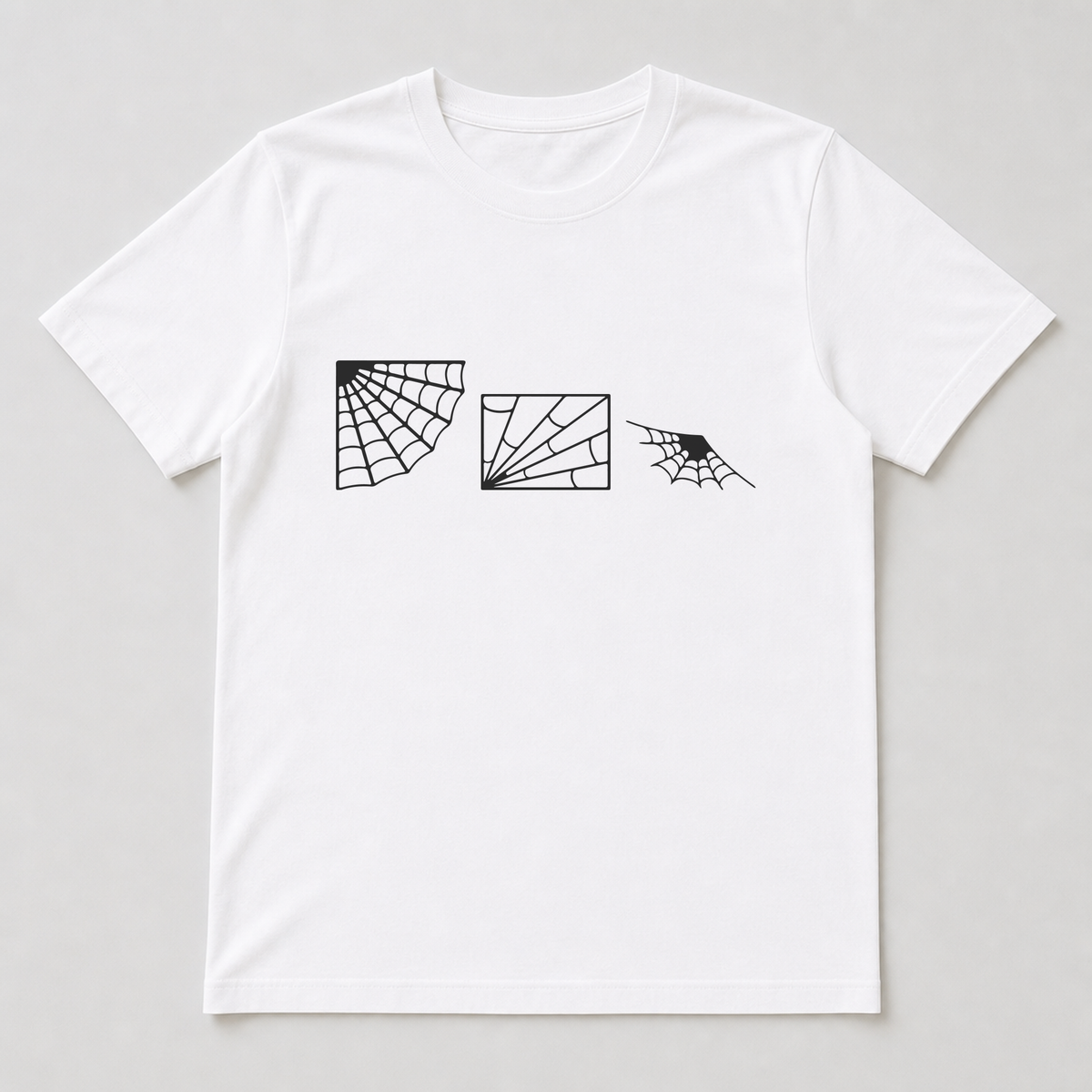 White t-shirt featuring a spiderweb print across the chest